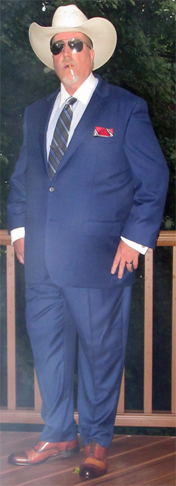 Paul Evans havana brown oxford toe dress shoes, blue suit, and Marlboro
