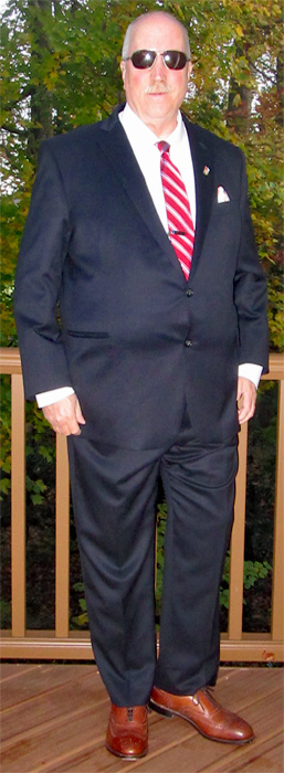 Allen Edmonds McAllister Chili Wingtip Dress Shoe with a suit